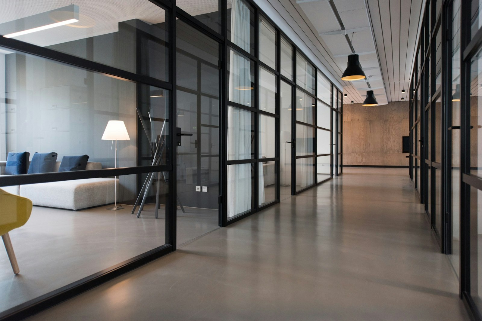 Bright modern corporate office with glass meeting rooms
